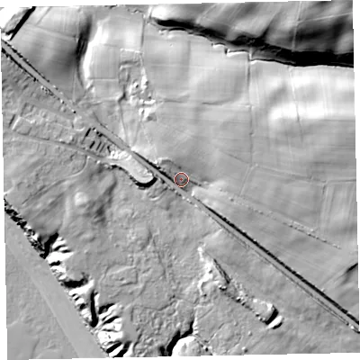 Shaded relief map of the ground around CA201NZ, computed from Environment Agency LiDAR. The ground here sits at about 18 m above sea level and falls 35 m across the surrounding 800 m. Surface water reaching this point runs off ground lying to the east-north-east, 10.2 m higher.
