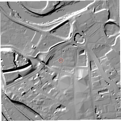 Shaded relief map of the ground around CA38QP, computed from Environment Agency LiDAR. The ground here sits at about 13 m above sea level and falls 19 m across the surrounding 800 m. Surface water reaching this point runs off ground lying to the south, 15.0 m higher.