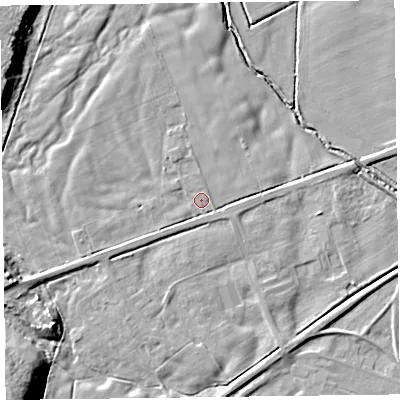 Shaded relief map of the ground around CA65LU, computed from Environment Agency LiDAR. The ground here sits at about 12 m above sea level and falls 13 m across the surrounding 800 m. Surface water reaching this point runs off ground lying to the north-west, 2.2 m higher.