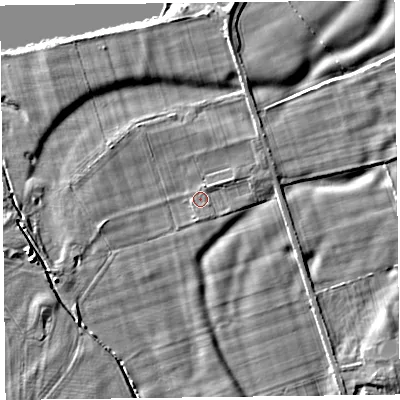 Shaded relief map of the ground around CA65LZ, computed from Environment Agency LiDAR. The ground here sits at about 13 m above sea level and falls 4 m across the surrounding 800 m. Surface water reaching this point runs off ground lying to the east-north-east, 1.0 m higher.