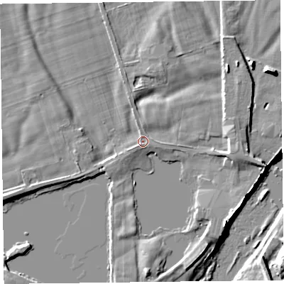 Shaded relief map of the ground around CA65XL, computed from Environment Agency LiDAR. The ground here sits at about 13 m above sea level and falls 10 m across the surrounding 800 m. Surface water reaching this point runs off ground lying to the south-south-west, 1.3 m higher.