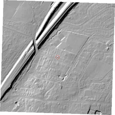 Shaded relief map of the ground around CM131DT, computed from Environment Agency LiDAR. The ground here sits at about 69 m above sea level and falls 20 m across the surrounding 800 m. Surface water reaching this point runs off ground lying to the south, 7.1 m higher.