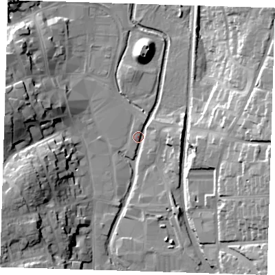 Shaded relief map of the ground around CM232DN, computed from Environment Agency LiDAR. The ground here sits at about 57 m above sea level and falls 23 m across the surrounding 800 m. Surface water reaching this point runs off ground lying to the east, 21.6 m higher.