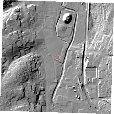 Shaded relief map of the ground around CM233AS, computed from Environment Agency LiDAR. The ground here sits at about 57 m above sea level and falls 25 m across the surrounding 800 m. Surface water reaching this point runs off ground lying to the west-south-west, 24.3 m higher.