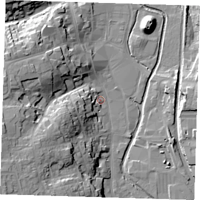 Shaded relief map of the ground around CM233AT, computed from Environment Agency LiDAR. The ground here sits at about 59 m above sea level and falls 29 m across the surrounding 800 m. Surface water reaching this point runs off ground lying to the west, 10.1 m higher.