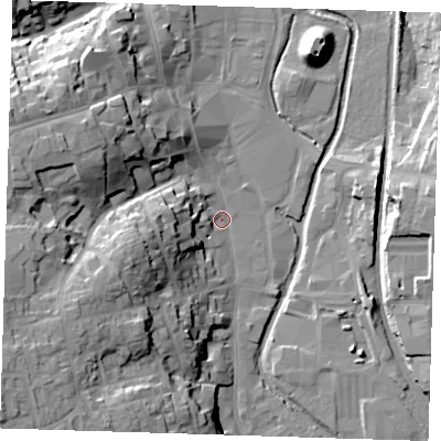 Shaded relief map of the ground around CM233FT, computed from Environment Agency LiDAR. The ground here sits at about 57 m above sea level and falls 28 m across the surrounding 800 m. Surface water reaching this point runs off ground lying to the west, 6.3 m higher.