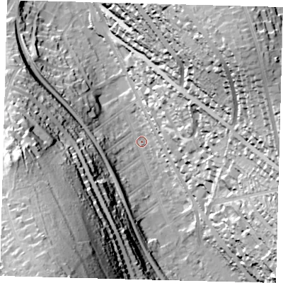 Shaded relief map of the ground around CR82DU, computed from Environment Agency LiDAR. The ground here sits at about 69 m above sea level and falls 68 m across the surrounding 800 m. Surface water reaching this point runs off ground lying to the south-south-west, 64.3 m higher.