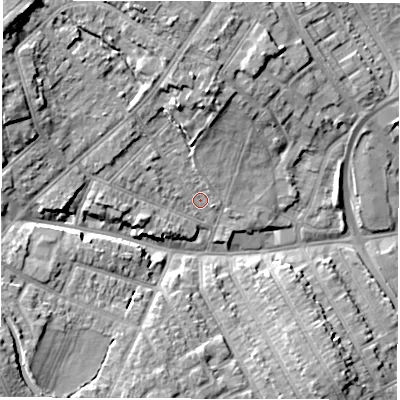 Shaded relief map of the ground around CV115PZ, computed from Environment Agency LiDAR. The ground here sits at about 85 m above sea level and falls 13 m across the surrounding 800 m. Surface water reaching this point runs off ground lying to the north, 6.3 m higher.