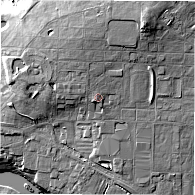 Shaded relief map of the ground around CV82LG, computed from Environment Agency LiDAR. The ground here sits at about 65 m above sea level and falls 19 m across the surrounding 800 m. Surface water reaching this point runs off ground lying to the south-west, 1.1 m higher.