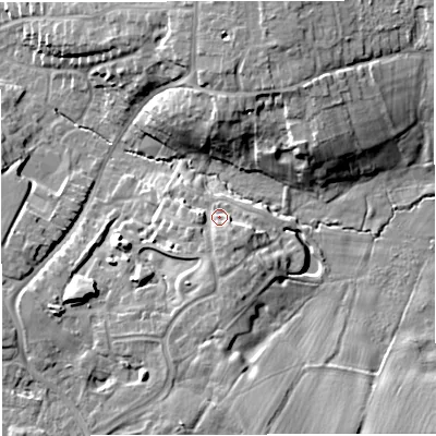 Shaded relief map of the ground around CW25FQ, computed from Environment Agency LiDAR. The ground here sits at about 57 m above sea level and falls 14 m across the surrounding 800 m. Surface water reaching this point runs off ground lying to the south, 4.4 m higher.