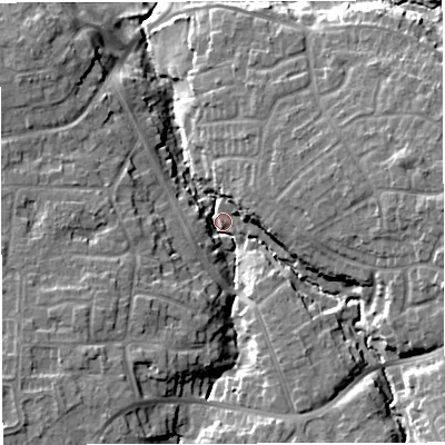 Shaded relief map of the ground around CW28EG, computed from Environment Agency LiDAR. The ground here sits at about 39 m above sea level and falls 14 m across the surrounding 800 m. Surface water reaching this point runs off ground lying to the east, 11.6 m higher.