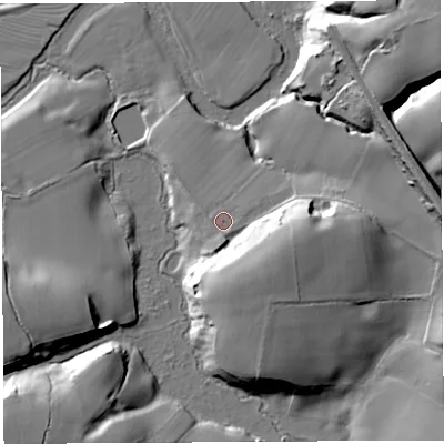 Shaded relief map of the ground around CW82RZ, computed from Environment Agency LiDAR. The ground here sits at about 12 m above sea level and falls 28 m across the surrounding 800 m. Surface water reaching this point runs off ground lying to the south-east, 14.7 m higher.