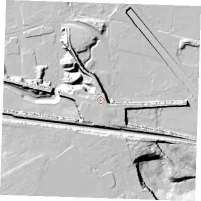 Shaded relief map of the ground around DA100LQ, computed from Environment Agency LiDAR. The ground here sits at about 29 m above sea level and falls 39 m across the surrounding 800 m. Surface water reaching this point runs off ground lying to the east-north-east, 3.1 m higher.