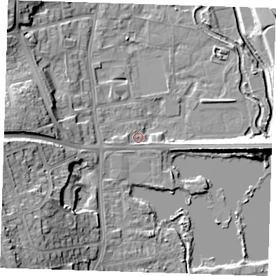 Shaded relief map of the ground around DA11JT, computed from Environment Agency LiDAR. The ground here sits at about 7 m above sea level and falls 21 m across the surrounding 800 m. Surface water reaching this point runs off ground lying to the east, 11.4 m higher.