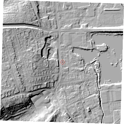 Shaded relief map of the ground around DA11LH, computed from Environment Agency LiDAR. The ground here sits at about 9 m above sea level and falls 27 m across the surrounding 800 m. Surface water reaching this point runs off ground lying to the west-south-west, 15.7 m higher.