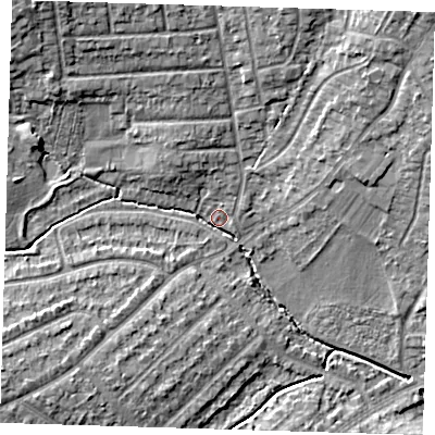 Shaded relief map of the ground around DA158HT, computed from Environment Agency LiDAR. The ground here sits at about 32 m above sea level and falls 13 m across the surrounding 800 m. Surface water reaching this point runs off ground lying to the north-west, 10.1 m higher.