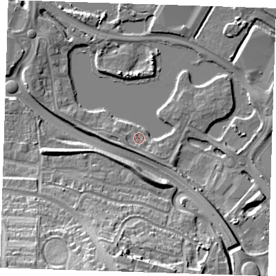 Shaded relief map of the ground around DA15FX, computed from Environment Agency LiDAR. The ground here sits at about 4 m above sea level and falls 25 m across the surrounding 800 m. Surface water reaching this point runs off ground lying to the south-east, 2.5 m higher.