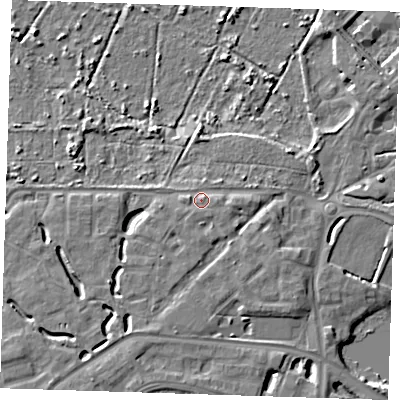 Shaded relief map of the ground around DA15GX, computed from Environment Agency LiDAR. The ground here sits at about 6 m above sea level and falls 9 m across the surrounding 800 m. Surface water reaching this point runs off ground lying to the south-west, 4.8 m higher.