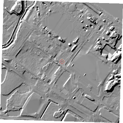 Shaded relief map of the ground around DA15XT, computed from Environment Agency LiDAR. The ground here sits at about 4 m above sea level and falls 14 m across the surrounding 800 m. Surface water reaching this point runs off ground lying to the east-north-east, 5.5 m higher.