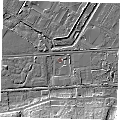Shaded relief map of the ground around DA184AE, computed from Environment Agency LiDAR. The ground here sits at about 0 m above sea level and falls 12 m across the surrounding 800 m. Surface water reaching this point runs off ground lying to the east-south-east, 3.3 m higher.