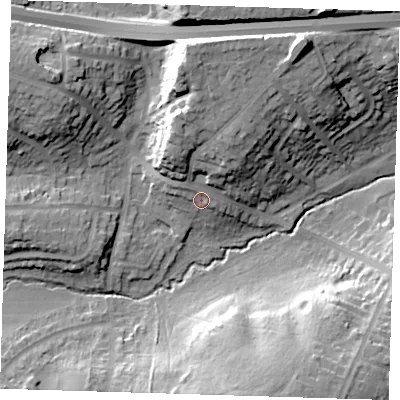 Shaded relief map of the ground around DA51JF, computed from Environment Agency LiDAR. The ground here sits at about 23 m above sea level and falls 25 m across the surrounding 800 m. Surface water reaching this point runs off ground lying to the north-north-east, 9.1 m higher.