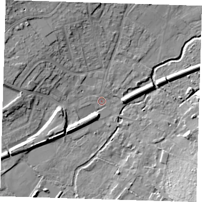 Shaded relief map of the ground around DA51LB, computed from Environment Agency LiDAR. The ground here sits at about 13 m above sea level and falls 16 m across the surrounding 800 m. Surface water reaching this point runs off ground lying to the west-north-west, 8.8 m higher.