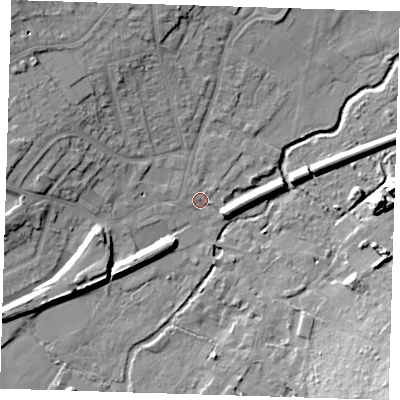 Shaded relief map of the ground around DA51LG, computed from Environment Agency LiDAR. The ground here sits at about 13 m above sea level and falls 17 m across the surrounding 800 m. Surface water reaching this point runs off ground lying to the west-north-west, 9.2 m higher.
