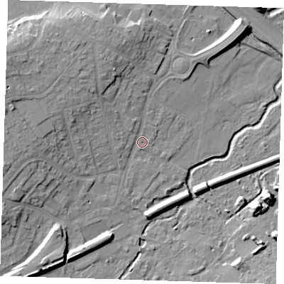 Shaded relief map of the ground around DA51LW, computed from Environment Agency LiDAR. The ground here sits at about 13 m above sea level and falls 14 m across the surrounding 800 m. Surface water reaching this point runs off ground lying to the west-north-west, 9.8 m higher.