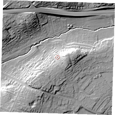 Shaded relief map of the ground around DA51QU, computed from Environment Agency LiDAR. The ground here sits at about 26 m above sea level and falls 28 m across the surrounding 800 m. Surface water reaching this point runs off ground lying to the east, 10.0 m higher.