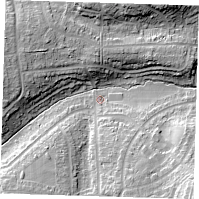 Shaded relief map of the ground around DA53AT, computed from Environment Agency LiDAR. The ground here sits at about 21 m above sea level and falls 22 m across the surrounding 800 m. Surface water reaching this point runs off ground lying to the south-south-east, 10.9 m higher.