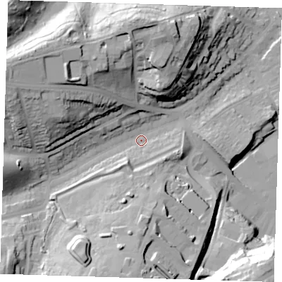Shaded relief map of the ground around DA81PU, computed from Environment Agency LiDAR. The ground here sits at about 12 m above sea level and falls 43 m across the surrounding 800 m. Surface water reaching this point runs off ground lying to the west-north-west, 32.4 m higher.