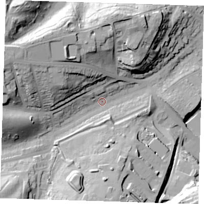 Shaded relief map of the ground around DA81PX, computed from Environment Agency LiDAR. The ground here sits at about 13 m above sea level and falls 44 m across the surrounding 800 m. Surface water reaching this point runs off ground lying to the west-north-west, 33.2 m higher.