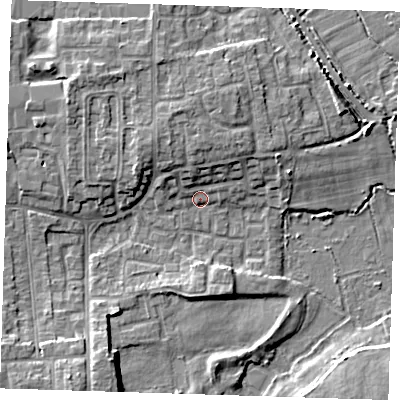 Shaded relief map of the ground around DA82LP, computed from Environment Agency LiDAR. The ground here sits at about 3 m above sea level and falls 7 m across the surrounding 800 m. Surface water reaching this point runs off ground lying to the north, 4.4 m higher.