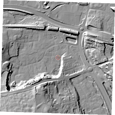 Shaded relief map of the ground around DA99PE, computed from Environment Agency LiDAR. The ground here sits at about 4 m above sea level and falls 38 m across the surrounding 800 m. Surface water reaching this point runs off ground lying to the south-west, 23.2 m higher.