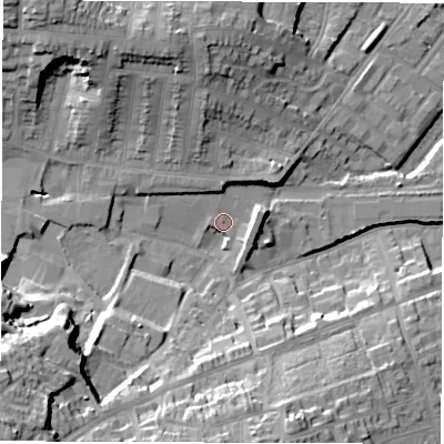Shaded relief map of the ground around DE11LQ, computed from Environment Agency LiDAR. The ground here sits at about 57 m above sea level and falls 29 m across the surrounding 800 m. Surface water reaching this point runs off ground lying to the south-west, 26.5 m higher.