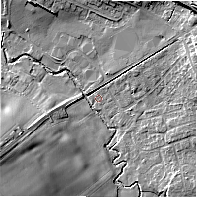 Shaded relief map of the ground around DE127GE, computed from Environment Agency LiDAR. The ground here sits at about 77 m above sea level and falls 25 m across the surrounding 800 m. Surface water reaching this point runs off ground lying to the north-east, 1.1 m higher.
