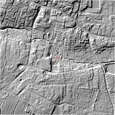 Shaded relief map of the ground around DE138JA, computed from Environment Agency LiDAR. The ground here sits at about 57 m above sea level and falls 15 m across the surrounding 800 m. Surface water reaching this point runs off ground lying to the north-west, 11.7 m higher.