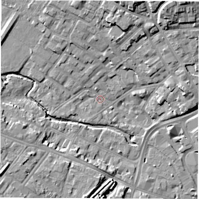Shaded relief map of the ground around DE13PH, computed from Environment Agency LiDAR. The ground here sits at about 49 m above sea level and falls 18 m across the surrounding 800 m. Surface water reaching this point runs off ground lying to the north-north-east, 12.4 m higher.