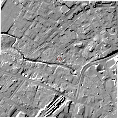 Shaded relief map of the ground around DE13TE, computed from Environment Agency LiDAR. The ground here sits at about 50 m above sea level and falls 16 m across the surrounding 800 m. Surface water reaching this point runs off ground lying to the west-south-west, 10.7 m higher.