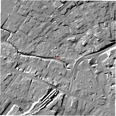 Shaded relief map of the ground around DE13UD, computed from Environment Agency LiDAR. The ground here sits at about 49 m above sea level and falls 14 m across the surrounding 800 m. Surface water reaching this point runs off ground lying to the west-south-west, 9.9 m higher.