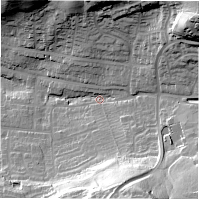Shaded relief map of the ground around DE159DB, computed from Environment Agency LiDAR. The ground here sits at about 59 m above sea level and falls 57 m across the surrounding 800 m. Surface water reaching this point runs off ground lying to the north-east, 51.2 m higher.