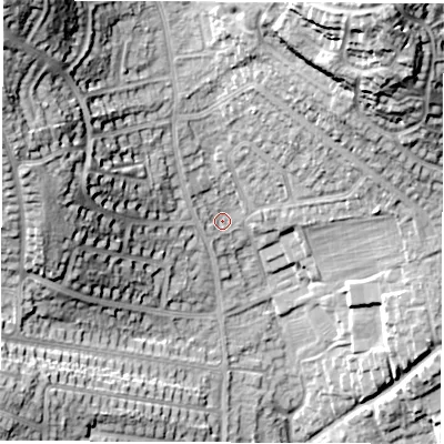 Shaded relief map of the ground around DE214NL, computed from Environment Agency LiDAR. The ground here sits at about 62 m above sea level and falls 35 m across the surrounding 800 m. Surface water reaching this point runs off ground lying to the north-north-east, 23.5 m higher.