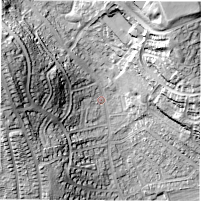 Shaded relief map of the ground around DE214PG, computed from Environment Agency LiDAR. The ground here sits at about 70 m above sea level and falls 38 m across the surrounding 800 m. Surface water reaching this point runs off ground lying to the north-north-east, 26.7 m higher.