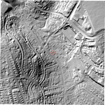 Shaded relief map of the ground around DE214PH, computed from Environment Agency LiDAR. The ground here sits at about 73 m above sea level and falls 35 m across the surrounding 800 m. Surface water reaching this point runs off ground lying to the north-north-east, 24.6 m higher.