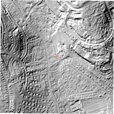 Shaded relief map of the ground around DE214PQ, computed from Environment Agency LiDAR. The ground here sits at about 69 m above sea level and falls 36 m across the surrounding 800 m. Surface water reaching this point runs off ground lying to the north-east, 13.0 m higher.
