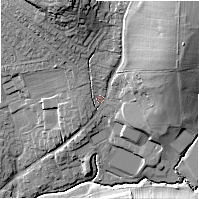 Shaded relief map of the ground around DE214QX, computed from Environment Agency LiDAR. The ground here sits at about 64 m above sea level and falls 35 m across the surrounding 800 m. Surface water reaching this point runs off ground lying to the north-east, 23.6 m higher.