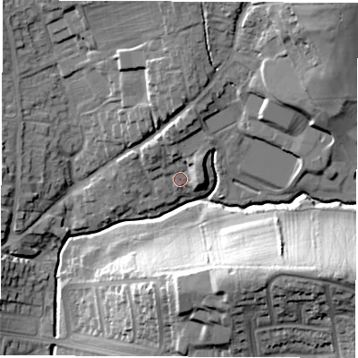 Shaded relief map of the ground around DE214RD, computed from Environment Agency LiDAR. The ground here sits at about 57 m above sea level and falls 32 m across the surrounding 800 m. Surface water reaching this point runs off ground lying to the north-north-east, 6.8 m higher.
