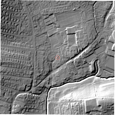 Shaded relief map of the ground around DE214RJ, computed from Environment Agency LiDAR. The ground here sits at about 57 m above sea level and falls 29 m across the surrounding 800 m. Surface water reaching this point runs off ground lying to the east-north-east, 6.8 m higher.