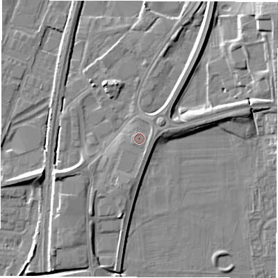 Shaded relief map of the ground around DE214RX, computed from Environment Agency LiDAR. The ground here sits at about 50 m above sea level and falls 13 m across the surrounding 800 m. Surface water reaching this point runs off ground lying to the east-north-east, 0.9 m higher.