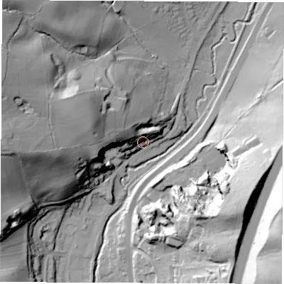 Shaded relief map of the ground around DE215AD, computed from Environment Agency LiDAR. The ground here sits at about 62 m above sea level and falls 68 m across the surrounding 800 m. Surface water reaching this point runs off ground lying to the north-west, 21.9 m higher.